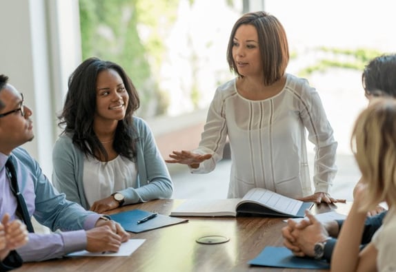 A brand meeting with a market research recruitment team to discuss how to find research participants.