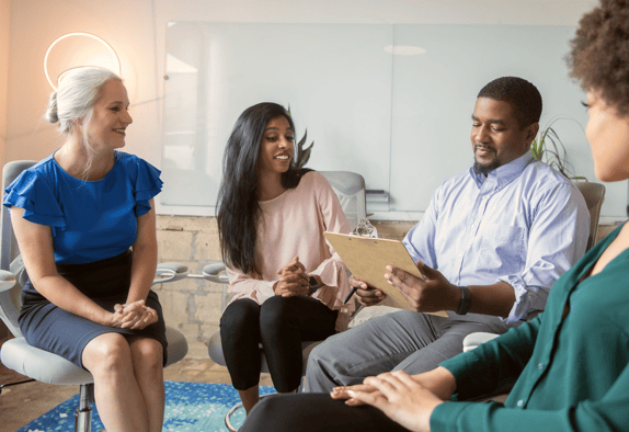 A moderator with a focus group.
